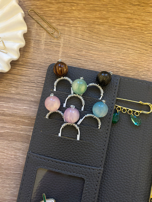 Cosmic Whisper Binder Charm
